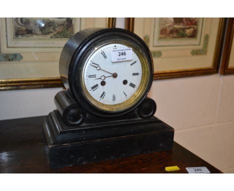 A Victorian ebonised mantel clock