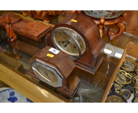 An oak cased Art Deco mantel clock, and another similar