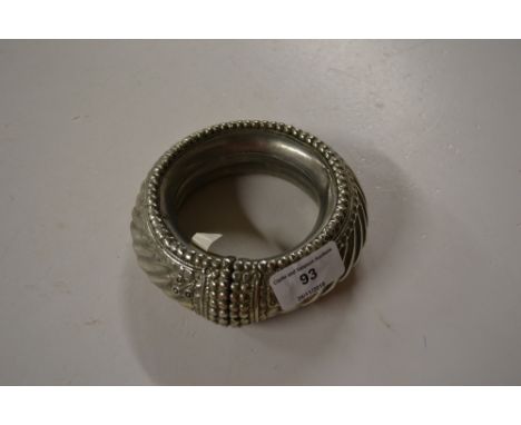 A heavy white metal slave's style bangle 