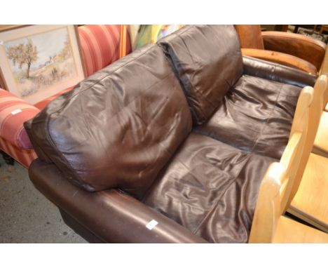 A Laura Ashley brown leather sofa