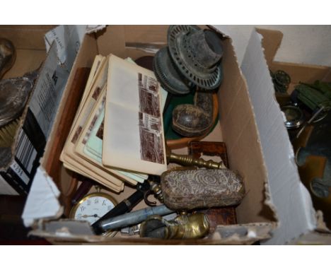 A box containing on oil lamp font, a pipe case, miniature brass candlesticks , stereoscopic viewing cards etc. 