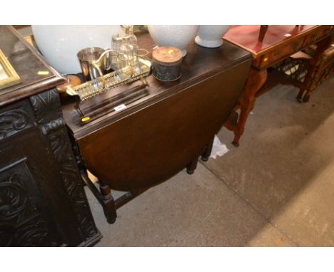 An oak gate leg dining table 