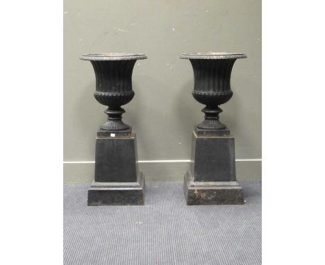 A pair of cast iron campagna garden urns, 86 x 40 cm 