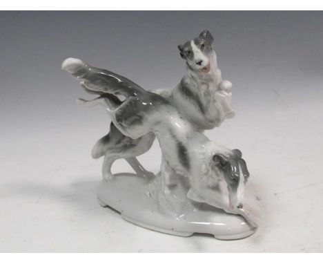 A model of two Borzoi leaping, mark on underside