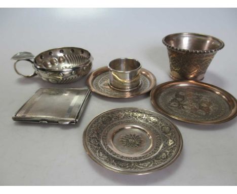 A silver tastevin, napkin ring and compact, 6ozt gross, together with a small collection of Iranian metalwares items, 8.3ozt