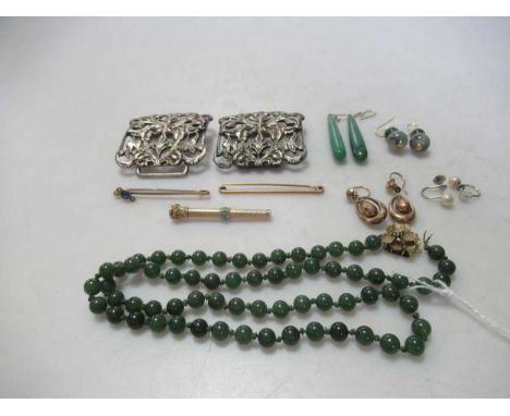A necklace of nephrite jade beads with a yellow metal push-in clasp, stamped '585 14K', a silver nurses buckle, a pair of bea