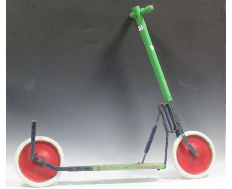 A vintage green painted push along scooter