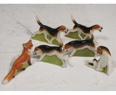 A set of Royal Worcester menu holders of a fox and hounds (6)Provenance:Landwade Hall, Exning, SuffolkCondition report: Fox i