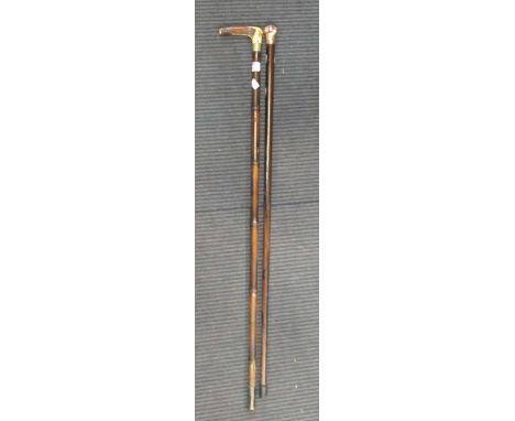 A 9ct gold capped walking cane and an antler handled horse measuring walking stick