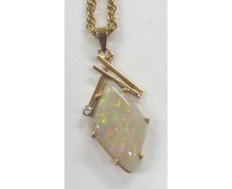 9 CT OPAL PENDANT. 9 ct gold Australian opal pendant with small diamond, 7,5g