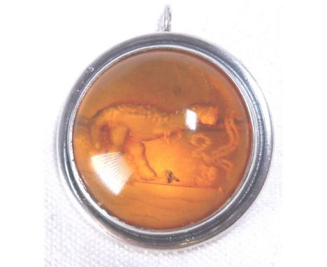 AMBER PENDANT. Vintage amber pendant set in silver
