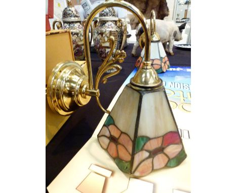 TIFFANY STYLE WALL LIGHTS. Three Tiffany style wall light fittings with brass supports