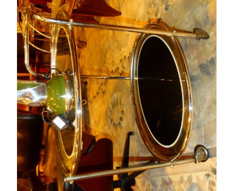 CHROME DRINKS TROLLEY. Two tier chrome drinks trolley with mirrored shelves  CONDITION REPORT: The item has no apparent damag
