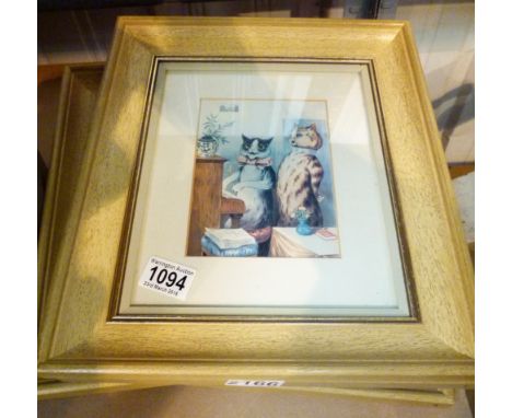 LOUIS WAIN PRINTS. Four framed Louis Wain style prints, cats at play