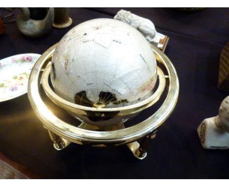 PEARLISED GLOBE. Brass mounted pearlised world globe with inset semi precious stones 
