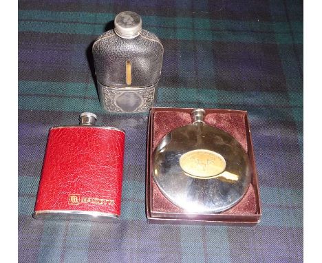 Two hip flasks and a Sporran flask