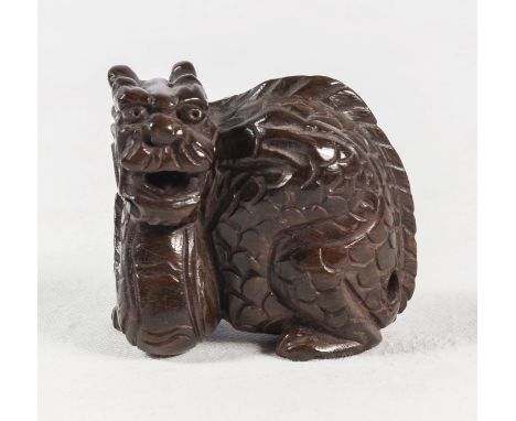 A Japanese dragon netsuke
