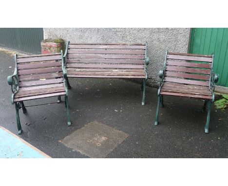 A garden bench and two chairs