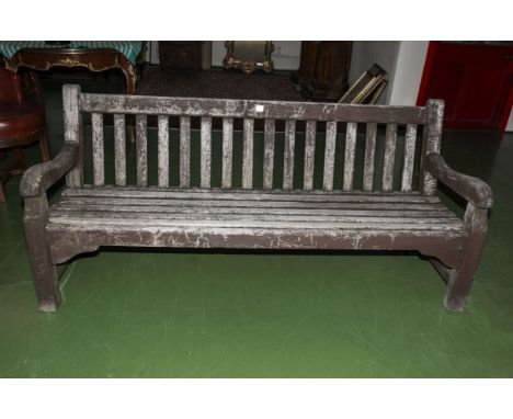 An old heavy wood garden bench.6ft wide .2ft 6inch tall.