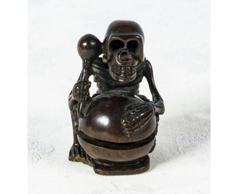 Signed hardwood netsuke skeleton with drum       