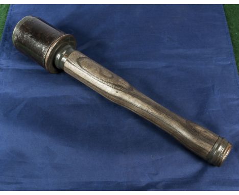 A German Nazi stick grenade with shrapnel cover number stamped for 1939