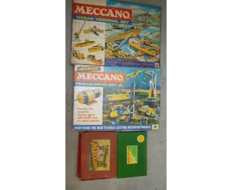 Nine Meccano Sets comprising:- Standard Range No 5, Army Multikit No 7, Ocean Terminal, Power Drive Set, Dinky Builder 1A, No
