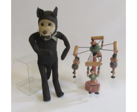 A pre-war "Felix the Cat", straw filled and wired body covered in black and white felt with shoe button eyes, 14 1/2" high, t
