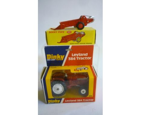 308 Leyland 384 Tractor, metallic red, boxed, G-E, 321 Massey Harris Manure Spreader, red hubs, boxed, E (2) (Est. plus 21% p