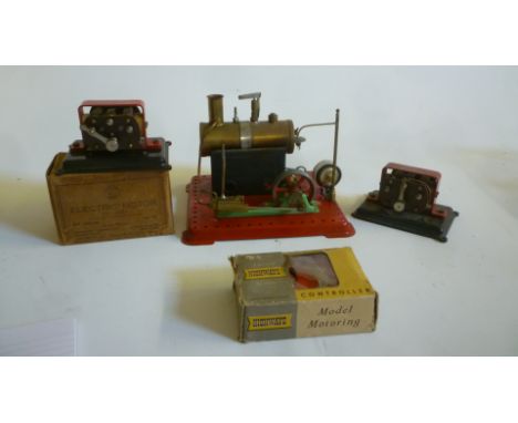 A Mamod type stationery engine with horizontal boiler, and electric light take-off on metal base, 8" wide, two electric motor