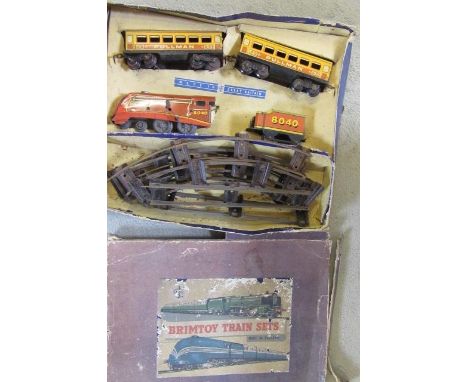 Brimtoy clockwork train set comprising 4-4-0 locomotive and tender, two Pullman coaches and track, boxed, P-F (Est. plus 21% 
