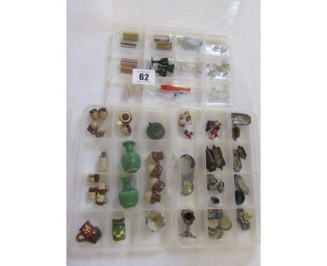 A collection of doll's house glass and ceramics including three green wine glasses, various clear goblets, striated beakers, 