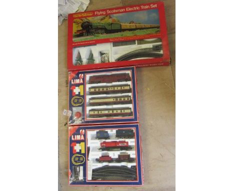A Lima Goods Train Set with diesel locomotive, a Lima Passenger Set with Western Gladiator diesel locomotive and three coache