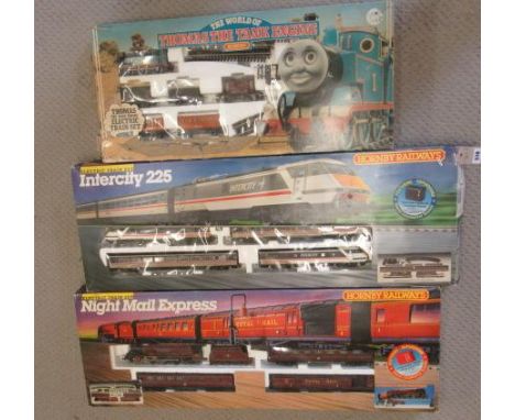 Three Hornby train sets comprising Intercity 125, Thomas the Tank engine and Night Mail Express, all items boxed, G-E (Est. p