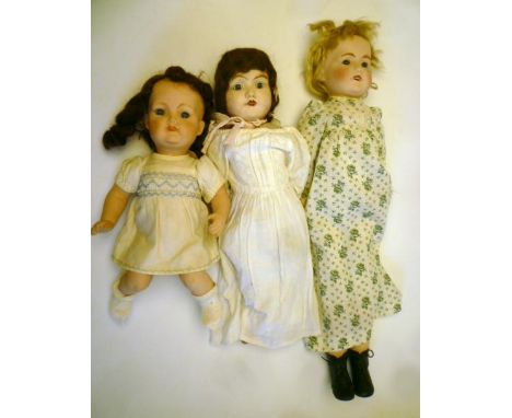 Three British made dolls comprising a Diamond Toddler with bisque head, fixed blue glass eyes, brown mohair wig, composition 