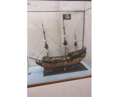 A model of a pirate ship the "Black Pearl", late 20th century, a three master in painted and stained wood, with full rigging 