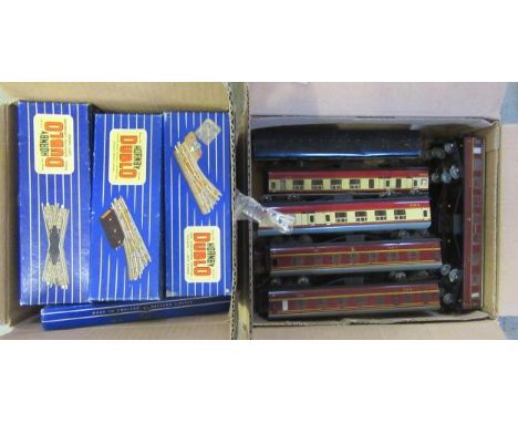 Hornby Dublo three rail track including electric and manual points, buffer stops and switches, and ten tin D1 coaches, some o