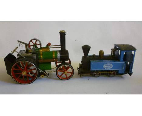 A Mamod TE1a traction engine with green boiler and wood running boards, modified chain steering with wheel, 10" long, and a M