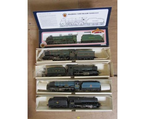 Five steam locomotives comprising Wrenn W2223 B.R. blue Castle, G.W.R. Castle repainted, G.W.R. Devizes Castle, Class 8F and 