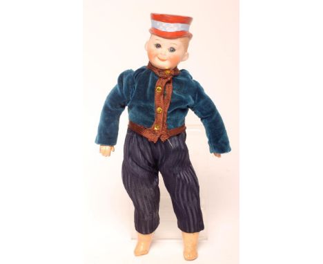 A Max Handwerck "Uncle Sam" bisque head doll with fixed blue glass eyes, closed mouth, integral painted hat, jointed composit