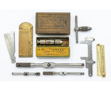 Clockmaker's tools Assorted Starrett and other makers tap wrenches and gauges. Pratt and Whitney Co wooden box.