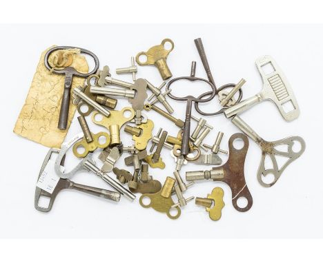 13 assorted mantel, French and wall clock winding keys.