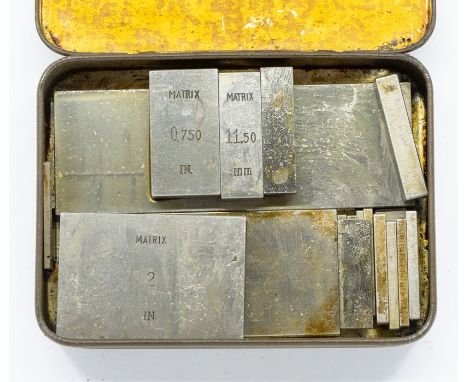 Clockmaker's tools assorted weights Matrix