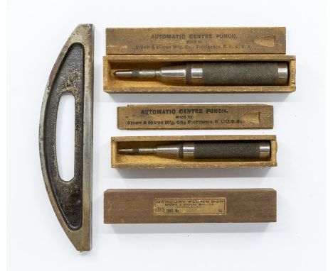 Clockmaker's tools A Brown and Sharpe mercury plum bob in original box, two automatic centre punches in original boxes. A cas
