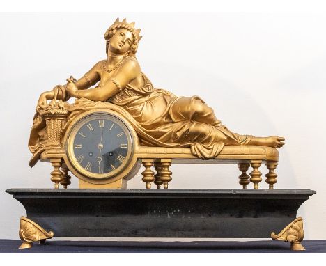 Large French mantel clock with reclined gilded lady on slate plinth. Rear leg of base missing. French two train movement, str