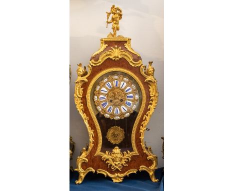 A good French Boulle wall clock with original bracket. Glided with maiden’s heads and cherub Gilded Dial Burr maple case, sun