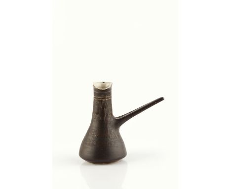 Lucie Rie (1902-1995) Pouring vessel sgraffito decoration impressed potter's seal 13cm high. Provenance: Collection of the ar