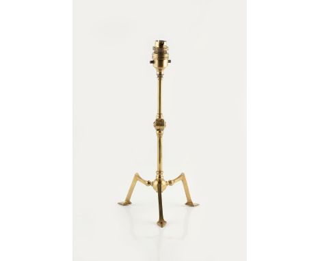 Manner of W.A.S. Benson (1854-1924) Table lamp, circa 1900 brass articulated stem, tripod base 36.5cm high.