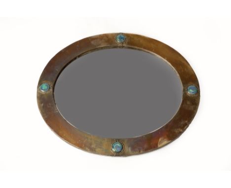 Attributed to Liberty & Co. Wall mirror brass frame, inset turquoise Ruskin roundels 53cm x 64cm.