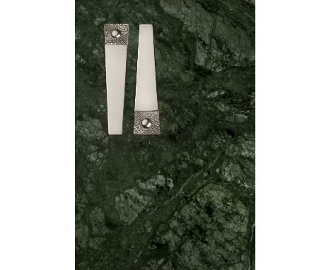 Stuart Devlin (b.1931) Two bookmarks parcel-gilt silver stamped maker's marks, London 1984 each 9.7cm long (2).