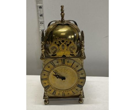 A brass cased lantern clock made by Smiths (battery operated, working), h24cm, shipping unavailablePlease note: All clocks de